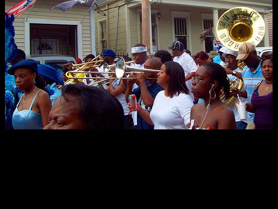 Philip Frazier leads the Rebirth Brass Band at the Original Lady Prince of Wales second line in October, 2008