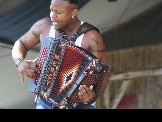 Dwayne Dopsie onstage at Jazz Fest 2011 [Photo by Bill Sasser]