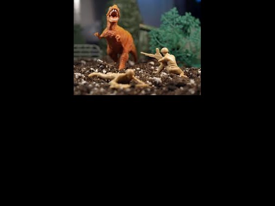 Army men fighting Godzilla