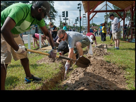 Volunteers help develop a Sankofa garden in the Lower 9th during a Day of Service on August 29, 2015 [Photo by Ryan Hodgson-Rigsbee, rhrphoto.com]