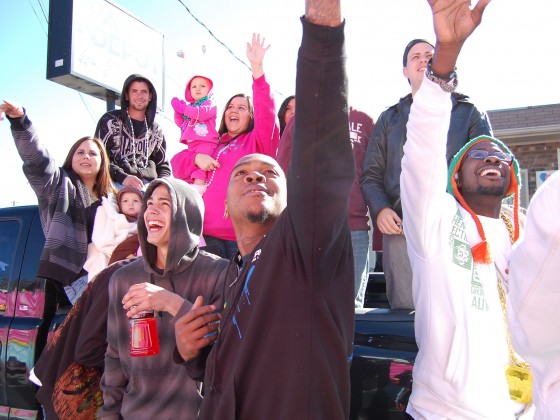 Rowdy bunch reaches for beads