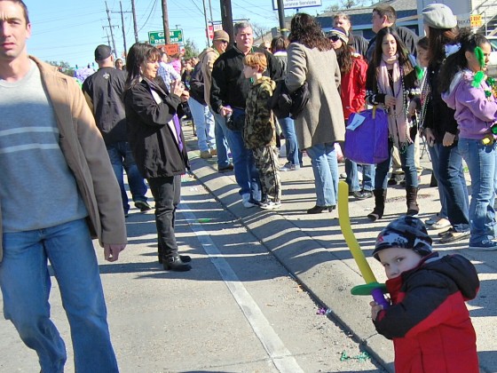 Kid assumes fencer's stance