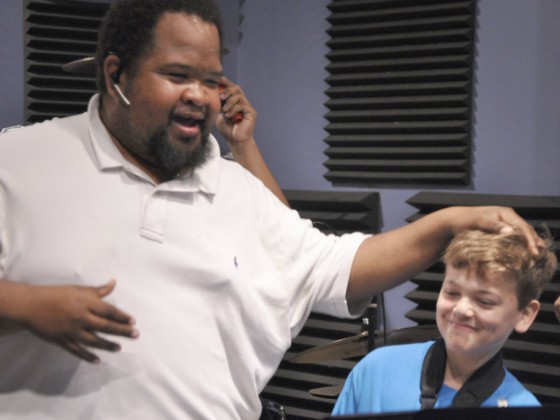 Desmond Venable with a member of the Red Wolf Brass Band [Photo by Leona Strassberg Steiner]