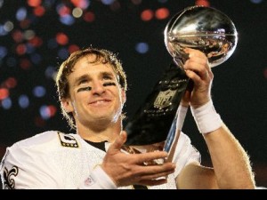 Drew Brees holding the Lombardi trophy in 2010(photo by Andy Lyons/Getty Images)