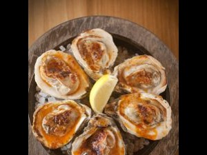 Make Grilled Oysters with Garlic-Chile Butter at home with Chef Link's recipe