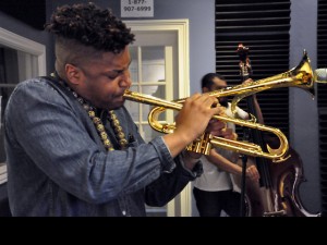 Christian Scott with his tilted bell trumpet [Photo by Kichea S. Burt]