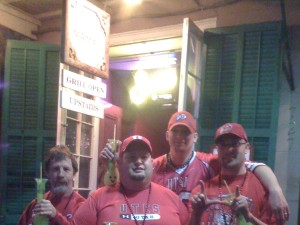 Utah fans with hand grenade drinks in front of Yo' Mama's after the Sugar Bowl