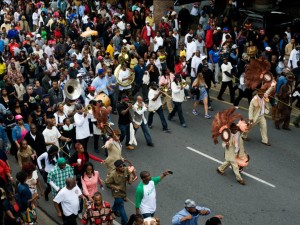 Treme Sidewalk Steppers and Rebirth Brass Band on Claiborne Ave in 2012 [Photo by Ryan Hodgson-Rigsbee]