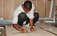 photo of youth creating artwork at YA/YA