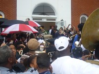 Crowds passed the casket overhead to the carriage at Dinerral Shavers' jazz funeral, January 6, 2007