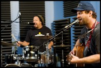 Garland Paul and Aaron Wilkinson of Honey Island Swamp Band performing at WWOZ in 2013 [Photo by Ryan Hodgson-Rigsbee]