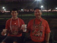 Two Utah fans with Cafe Du Monde food and drink at jackson Square at 1am after the Sugar Bowl.