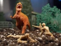 Army men fighting Godzilla